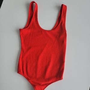 Beautiful blood orange body suit